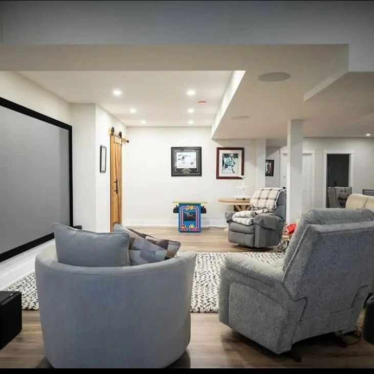 Finished basement interior painting — modern entertainment room by Byron Painting Co, Barrie Ontario